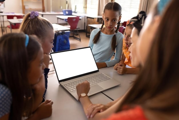 A classroom scene showcasing students engaged in a tech-enhanced standardized test on individual laptops. The teacher is monitoring progress from the front, with projected test instructions visible on a large screen. The room is well-lit and modern, reflecting a focus on technology integration in education.